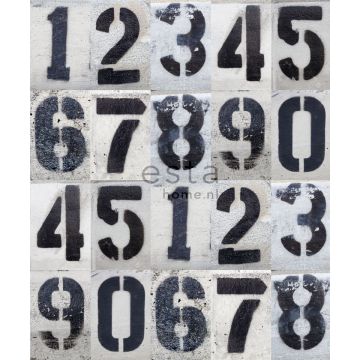 wall mural spray painted numbers on concrete wall black and white